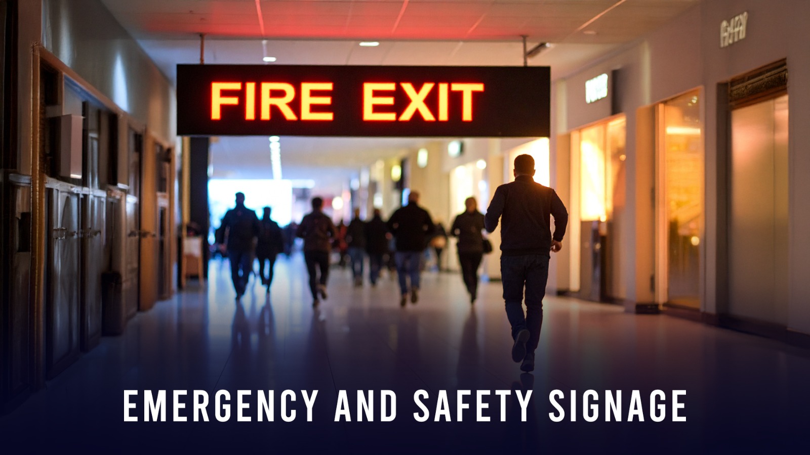 Emergency and safety signage in a commercial building with bilingual Arabic and English signs, including exit and fire safety signs